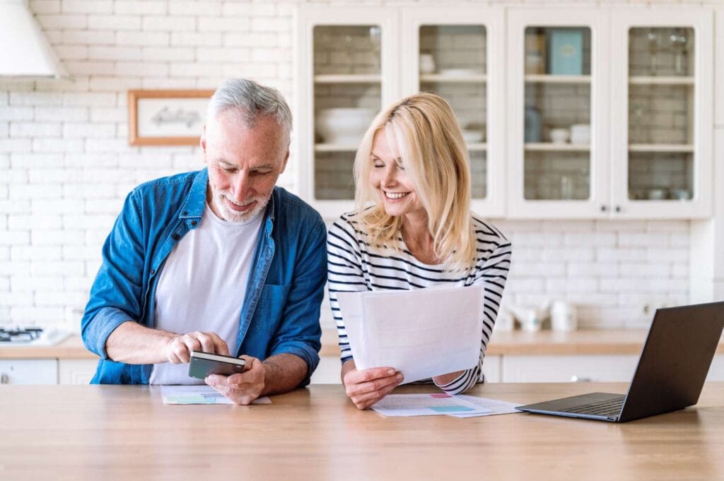 an old man discussing with a woman about income ideas for your retirement