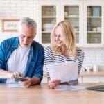 an old man discussing with a woman about income ideas for your retirement